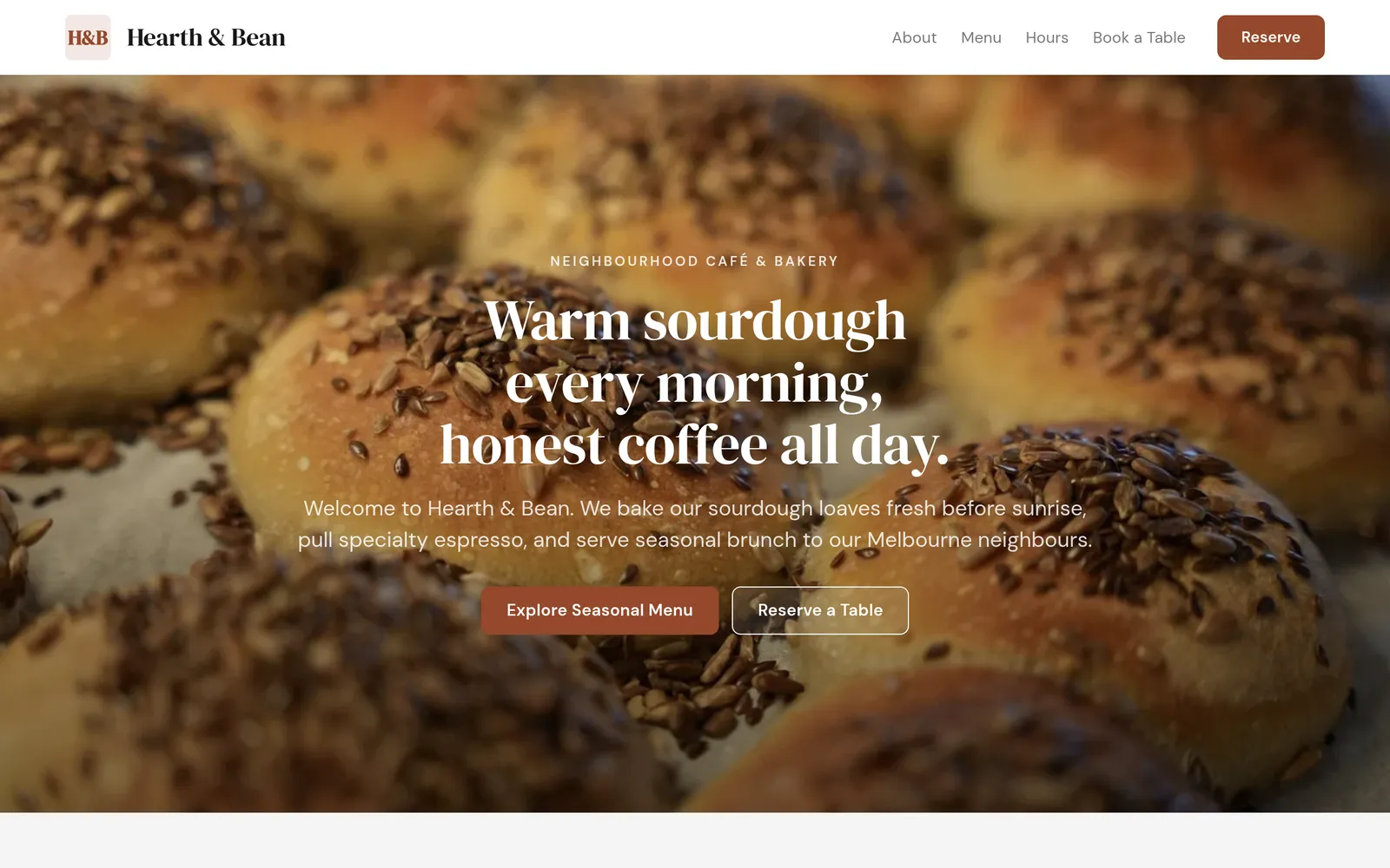 The Hearth & Bean example site: a large photo of fresh sourdough rolls under the headline